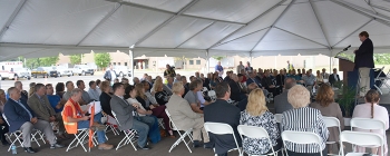 Portsmouth/Paducah Project Office Manager Robert Edwards addresses the audience at EMâs Portsmouth Site ceremony commemorating the first land transfer to the southern Ohio community.