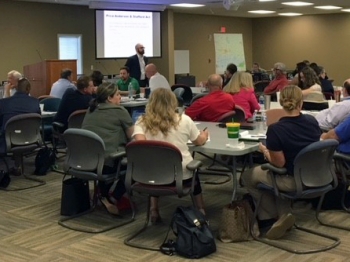 Participants in the Ingestion Pathway Exercise discuss techniques and approaches for a coordinated emergency response during refresher course in Alabama.