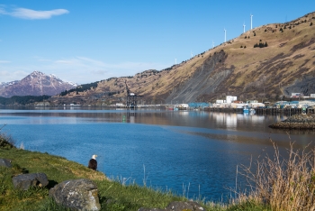 Wind turbines on Kodiak around the shipping dock.