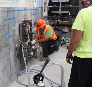 Download Workers Install Key Equipment in Hanford Mockup for ...
