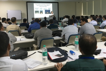 Dr. Fred Harper explaining the science of radioactive material dispersal to an audience of Indian first responders