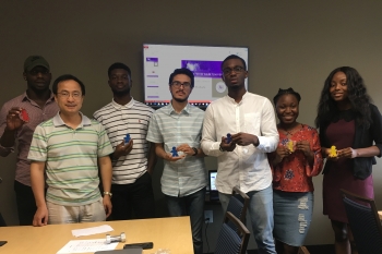 Final presentation winners, from left: Alvin Ibeabuchi, Huajun Fan, Adedapo Adetayo, Ali Rafique, Iyanuloluwa Olalumade, Joelle Tshikuta, and Prevailer Mba.