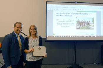 Kevin Carroll, DOE Sustainability Performance Office presented Heather Ottaway of LLNL with the Strategic Partnerships for Sustainability Award on behalf of LLNL and Sandiaâs joint âForge Ahead Towards Collaborative Sustainabilityâ project