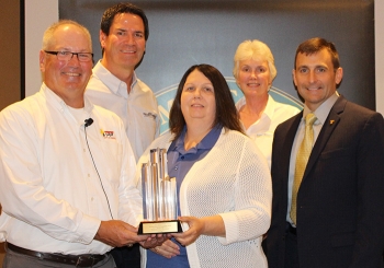 DOE Director of Worker Safety and Health Assistance Brad Davy presents the second consecutive Portsmouth Voluntary Protection Program Legacy of Stars award.