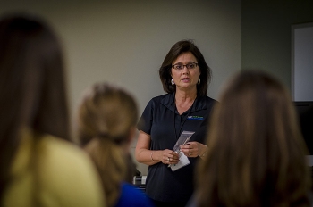 Four Rivers Nuclear Partnership Deputy Program Manager Myrna Redfield educates girls on opportunities for them to enter careers in science, technology, engineering, and mathematics.