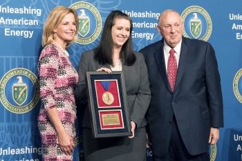 NNSA Administrator Lisa E. Gordon-Hagerty and Ambassador Linton F. Brooks presented Kaylyn Peters, center, with the achievement in a formal award ceremony at DOE Headquarters.