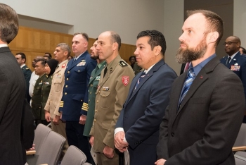 Office of Secure Transportation Agent Chris Sterie, right, with his NDU colleagues.