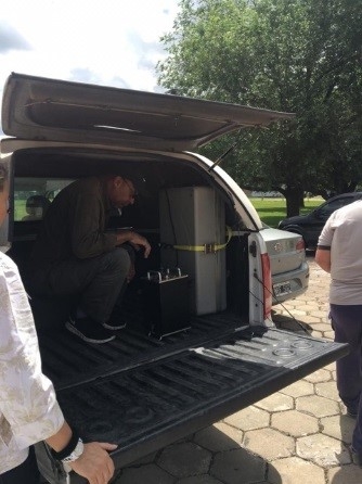 An NNSA employee prepares the equipment during setup before the Argentina G-20 summit.