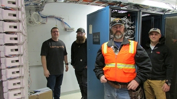 Robin Maples, Zack Larson, Joe Jensen, and Quinn Bragg with Mission Support Alliance were among the technicians who replaced access layer switches throughout the Hanford Site.