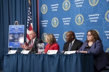 NNSAâs Jim McConnell, left, joined a panel about the pros and cons of the Senior Executive Service.