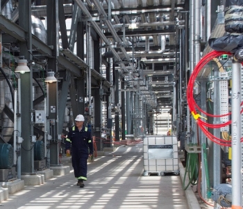A workers walks through the Cellulosic Ethanol Plant in Iowa