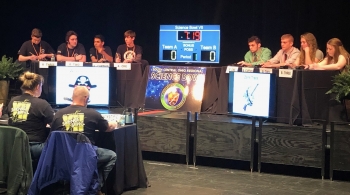 Teams from Wheelersburg, left, and Zane Trace compete in the championship match of the South Central Ohio Regional Science Bowl at Shawnee State University on Friday, March 15, 2019. Wheelersburg won the title match 46-12.