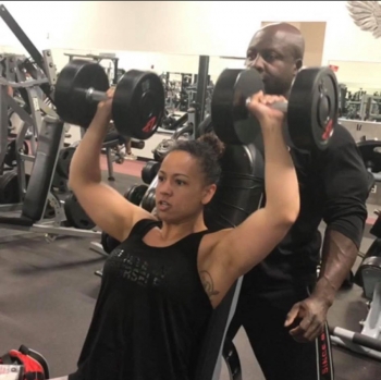 Keshan Velasquez trains with her coach.