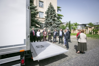 The partners inspect the security features of the vehicle at the Georgian Ministry of Environment Protection and Agriculture in Tbilisi, the capital.