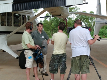 Jim Mather discusses research into tropical clouds with a news crew during a 2006 media day jointly organized by ARM and the Australian Bureau of Meteorology. Jim Mather discusses research into tropical clouds with a news crew during a 2006 media day jointly organized by ARM and the Australian Bureau of Meteorology.