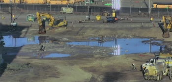 Before-and-after photos show how workers safely removed a concrete vault associated with the Plutonium Finishing Plantâs Main Processing Facility. Demolition began in April and was completed in mid-May.