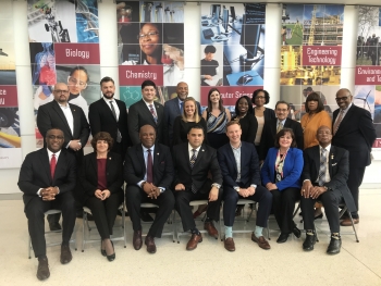 Staff at the conference pose in a group