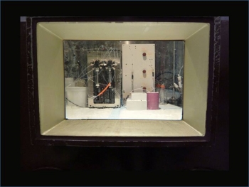 Prototype fluidic system for zirconium-89 purification. Image taken through a hot cell window at the Department of Radiology, University of Washington. Prototype fluidic system for zirconium-89 purification. Image taken through a hot cell window at the Department of Radiology, University of Washington.