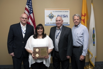 Marie Griego receives her NNSA Bradley A. Peterson Federal Security Professional of the Year award.