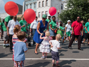 Children watch an Independence Day parade in Washington, D.C.