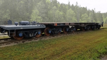 Image of part of a train on track trains.
