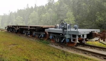 Image of part of a train on track trains.