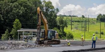 Oak Ridge Site workers remove asphalt and concrete on the east end of the Y-12 National Security Complex to prepare the site of the Mercury Treatment Facilityâs treatment plant.