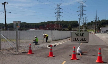Employees installed fences and barriers to identify the boundaries of the Mercury Treatment Facilityâs treatment plant and headworks facility, ensuring safety and security.