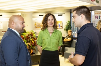 Shannon Swilley Greco, Science Education program leader, chats with John Martinez, Apprenticeship and Training Representative, U.S. Department of Labor (left), and Kevin Purdy Jr., Apprentice in the program. Shannon Swilley Greco, Science Education program leader, chats with John Martinez, Apprenticeship and Training Representative, U.S. Department of Labor (left), and Kevin Purdy Jr., Apprentice in the program.