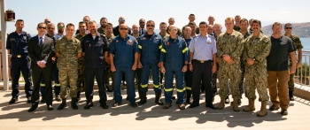 NNSA partnered with NATO to complete its first-ever Maritime Pilot course. Course participants pose for a group photo at Souda Bay Naval Base in Greece