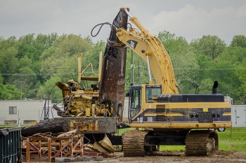 Four Rivers Nuclear Partnership Heavy Equipment Operator Brad Langston downsizes a decommissioned crane at the C-740 Material Yard.