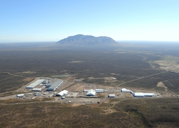 At top is a view of the Radioactive Waste Management Complex at DOE's Idaho National Laboratory Site. Ultimately, an earthen cover will be built over the site as shown in the rendering immediately above.
