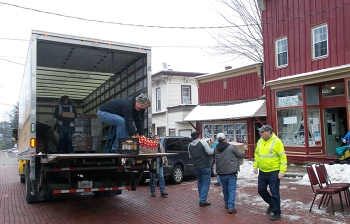 Volunteers in the West Valley Demonstration Projectâs annual food drive deliver 44 turkeys and other items to a food pantry in Cattaraugus, New York.