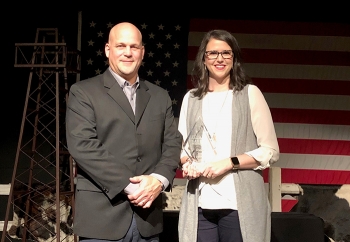 UCOR Safety & Health Operations Manager Chris Thursby and UCOR Chief of Staff Ashley Saunders accept an award as one of Americaâs Safest Companies for their work conducting environmental cleanup in Oak Ridge.