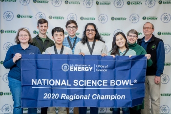 Gatton Academy Team One is shown with the winners' banner following the DOE West Kentucky Regional Science Bowl.