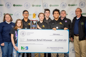 Lone Oak Middle School Team One took first place. Pictured left to right: DOE Paducah Site Lead Jennifer Woodard, Evie Maddox, Manav Shah, Owen Cody, Carter McReynolds, Cole Cannon, Coach Daniel Rushing and DOE Strategic Planner Buz Smith.