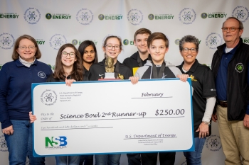 Lone Oak Middle School Team Two took third place. Pictured left to right: DOE Paducah Site Lead Jennifer Woodard, Ella Chuppe, Pratha Patel, Meg Kitchen, Carson Wallace, Kendrick Dunning, Coach Jacqueline Jones and DOE Strategic Planner Buz Smith.