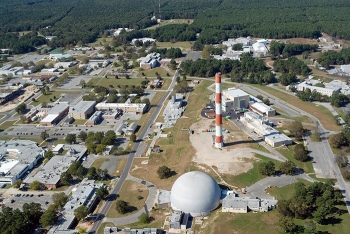 The red-and-white High Flux Beam Reactor exhaust stack â a pronounced part of the Brookhaven National Laboratory skyline for more than 70 years â is slated for demolition later this year.
