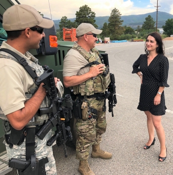 Unica Viramontes talks security with LANL security guards. Unica Viramontes talks security with LANL security guards.