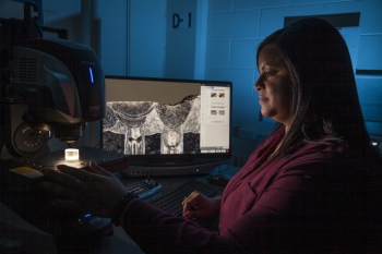 Diana Sanders analyzes the integrity of welds in a stainless steel tube. Metallography is one of many Y-12 National Security Complex's analytical capabilities used for ensuring nuclear-arsenal quality.