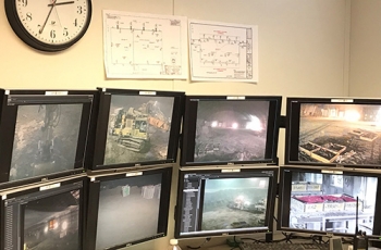 Operators monitor all facets of the Accelerated Retrieval Project through closed-circuit monitors.