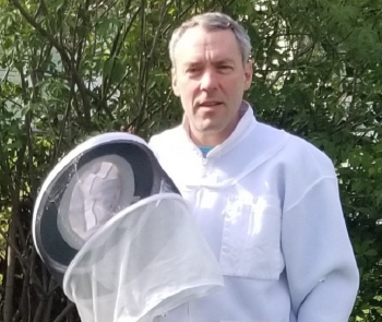 NNSA's Randy Weidman and some of the apparel he needs to maintain his beehives.