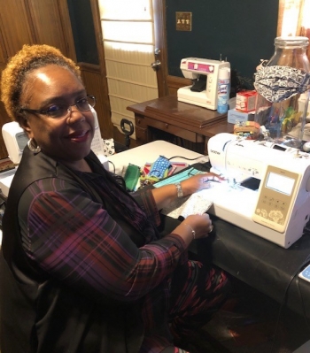 Cassandra Jones, an information security specialist at NNSA's Savannah River Field Office, sews masks to share with others during the coronavirus pandemic.