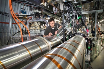 The components of the Low Energy RHIC electron Cooling assembly include 100 meters of beamline. In this beamline, accelerated electrons propagate with ions in one beam to extract their heat, then make a 180-degree turn to cool the ions in the other beam. The components of the Low Energy RHIC electron Cooling assembly include 100 meters of beamline. In this beamline, accelerated electrons propagate with ions in one beam to extract their heat, then make a 180-degree turn to cool the ions in the other beam.