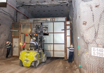 Bulkheads such as this one being installed in the Waste Isolation Pilot Plant (WIPP) underground help control airflow in different loops, or circuits. During the recent maintenance outage, remote controls connected to WIPPâs Central Monitoring Room were a