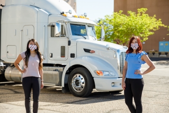 Sandia National Laboratories' quality engineer Dulce Barrera, left, and team lead Kylen Johns worked with managers and other team members to face the challenges caused by COVID-19 while working on the Mobile Guardian Transporter Prototype 1 test vehicle.