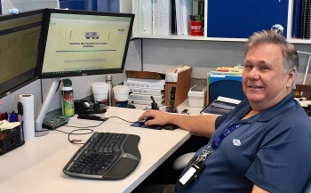 Lee Stevens, a transportation expert with Navarro Research and Engineering, the lead environmental program services contractor for EM Nevada, uses the Nevada National Security Site-based Hazardous Materials Notification System to monitor and manage shipme