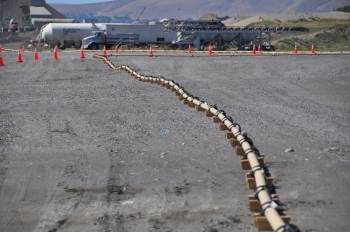 The EM Richland Operations Office and its contractor CH2M HILL Plateau Remediation Company are testing a conveyance system that will pump engineered grout through more than 1,500 feet of pipe to three underground at-risk structures at the Hanford Site.