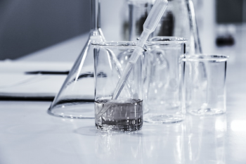 Laboratory equipment on a clean table.