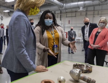 Y-12 Principal Investigator Felicia Rutland shows NNSA Administrator Lisa E Gordon-Hagerty items used in the Test and Demonstration Facility.